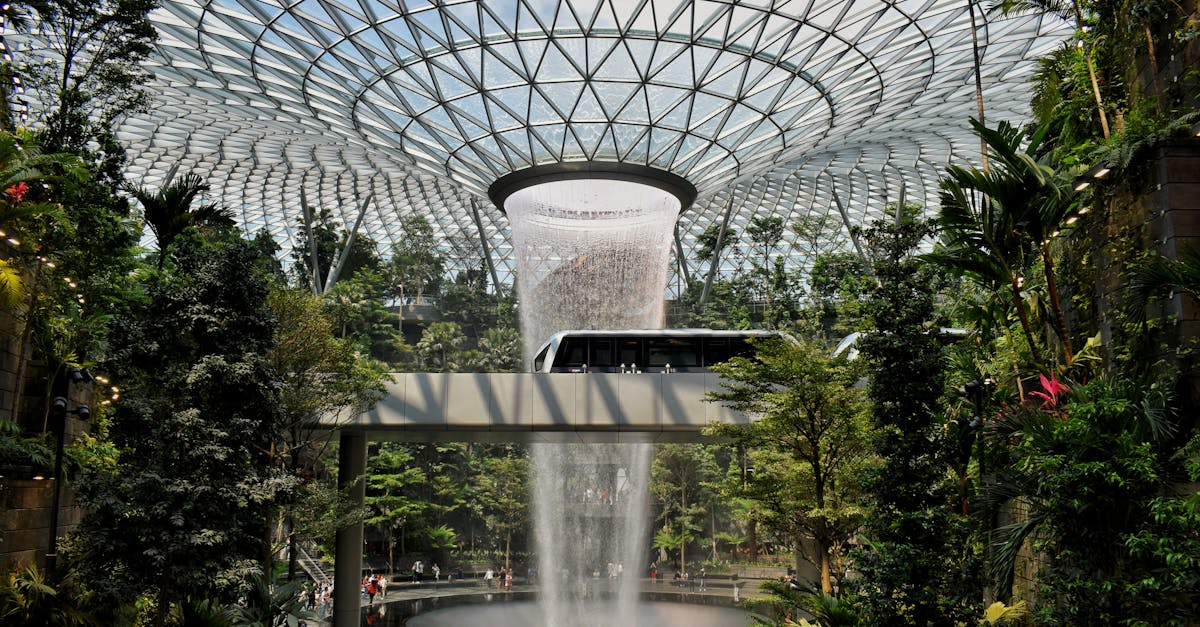 Breathtaking view of the HSBC Rain Vortex waterfall at Jewel Changi Airport, Singapore.
