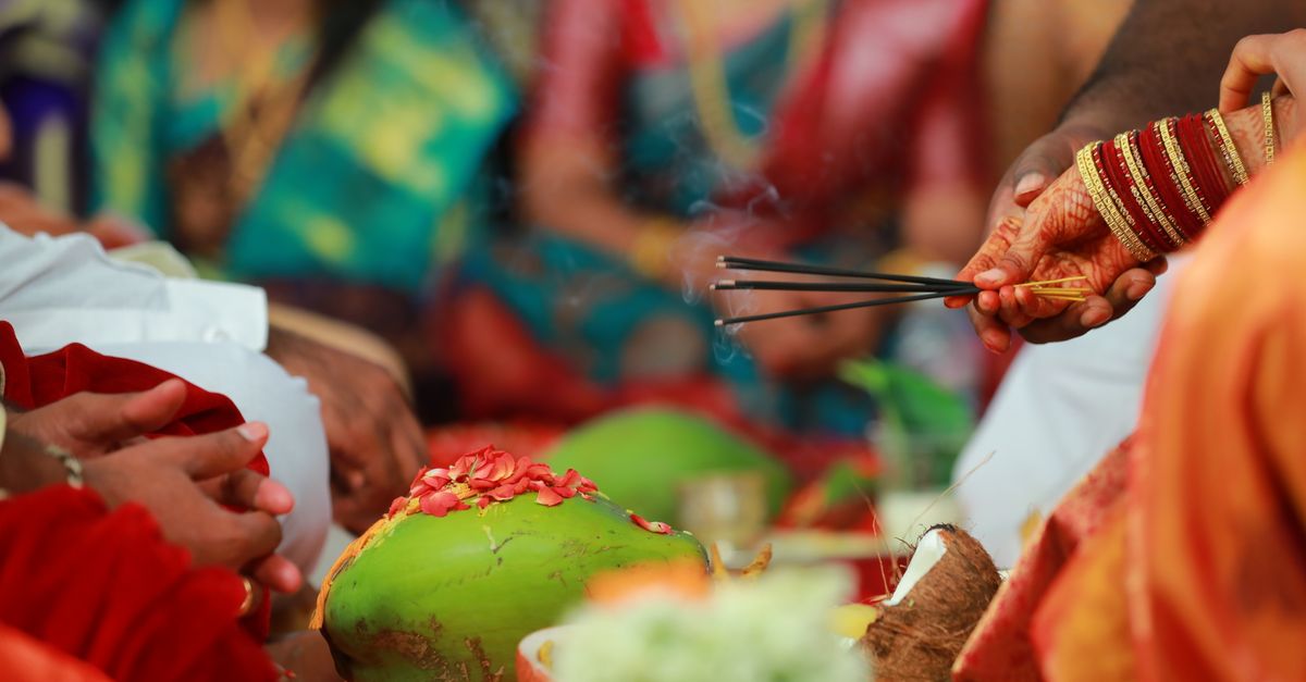 A vibrant scene of a traditional ceremony in Tirupati, showcasing colorful attire and rituals.