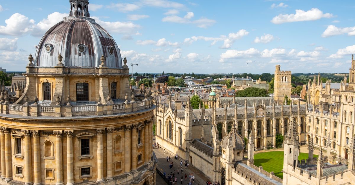 A beautiful aerial view of Oxford University's classic architecture on a bright day.