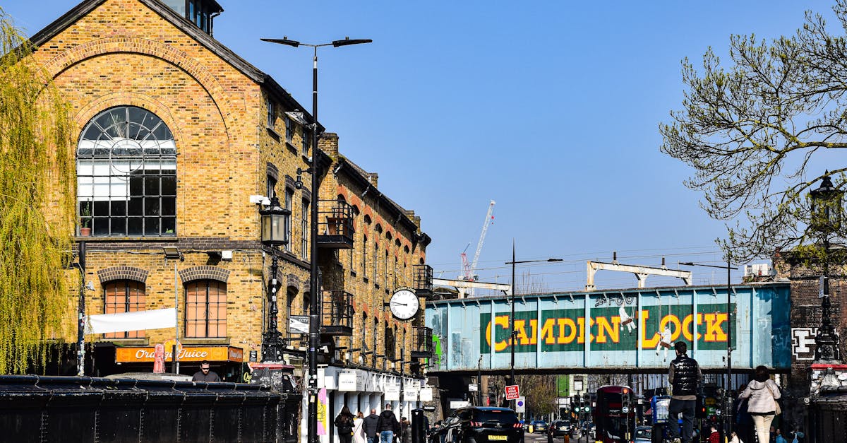 Explore the lively Camden Lock Market with historic architecture and bustling city atmosphere in London.