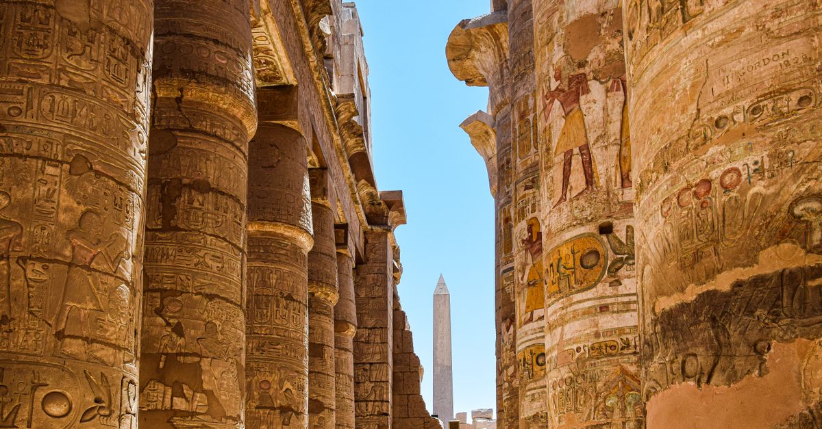 Explore the majestic columns and hieroglyphs at Karnak Temple in Egypt.