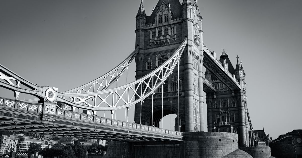 Elegant monochrome capture of Tower Bridge in London, showcasing its iconic architecture.