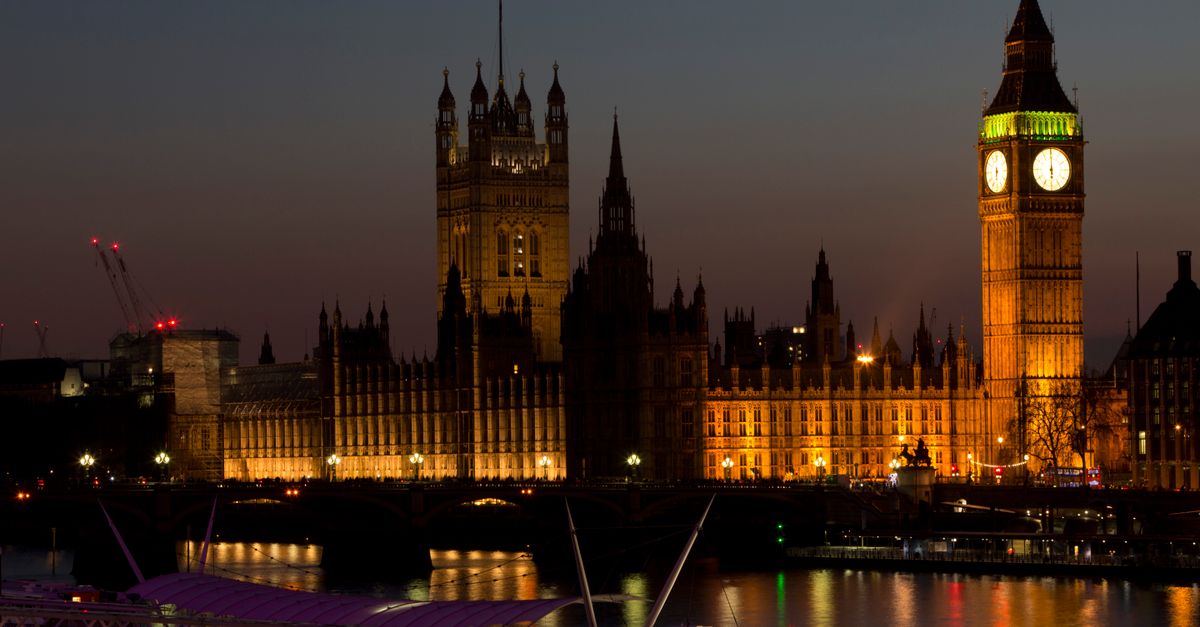 Illuminated Big Ben and Westminster Palace at twilight in London, England