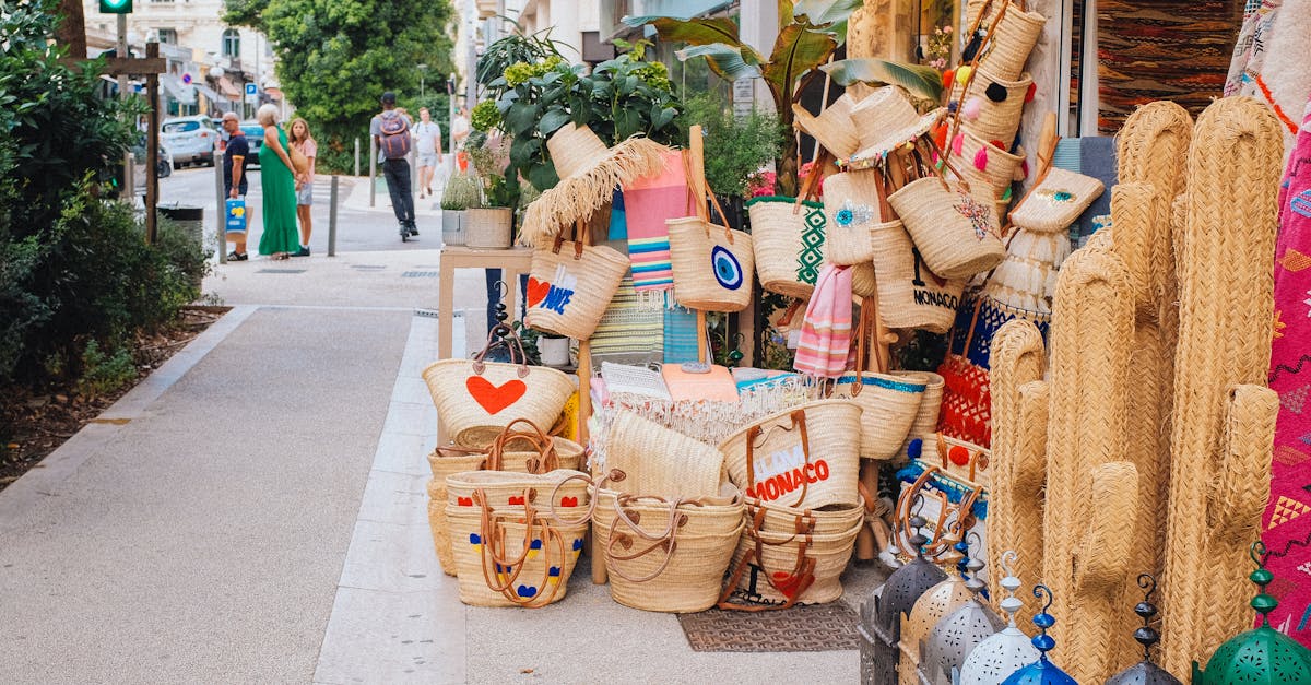 Vibrant street scene featuring handmade baskets and decor items along a charming Monaco sidewalk.