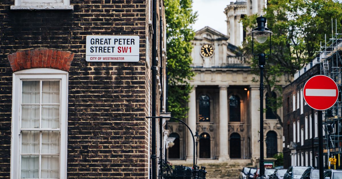 Iconic Westminster street scene with historic architecture in London, UK.