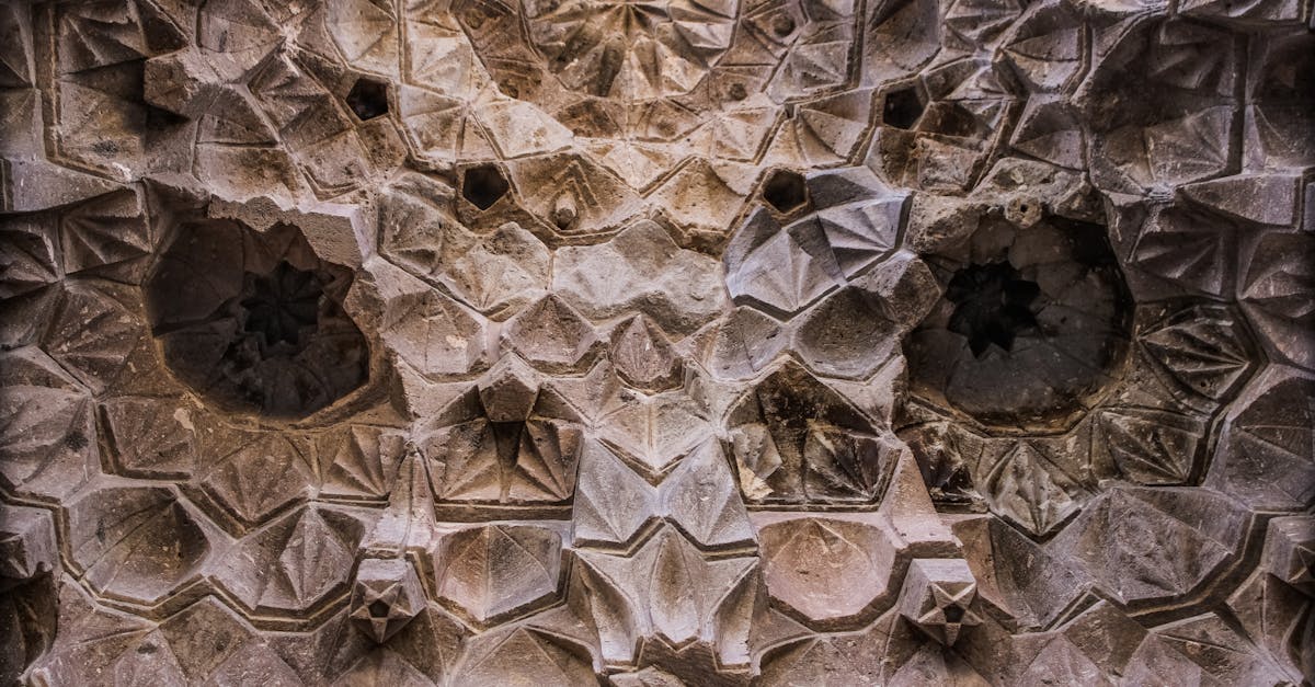 Close-up of intricate geometric stone patterns in Kırşehir, Türkiye, showcasing ancient artistry.