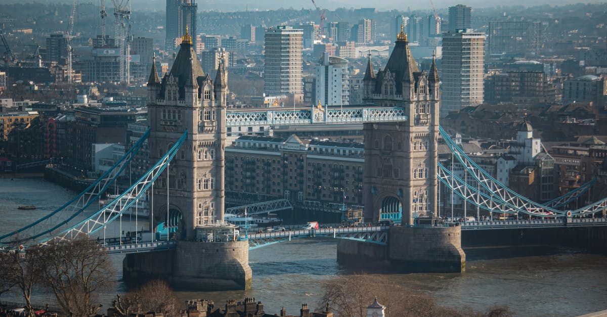 A stunning aerial shot of London's famous Tower Bridge with cityscape.