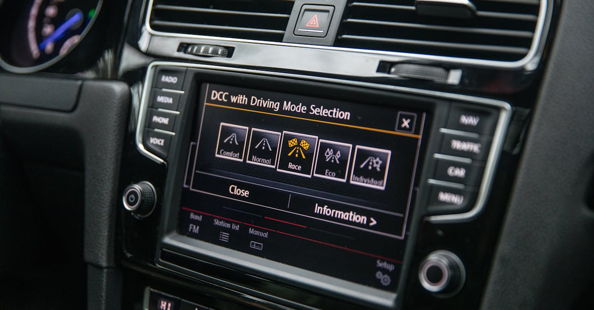 Close-up view of a car's touchscreen display showing driving mode options, enhancing vehicle control.