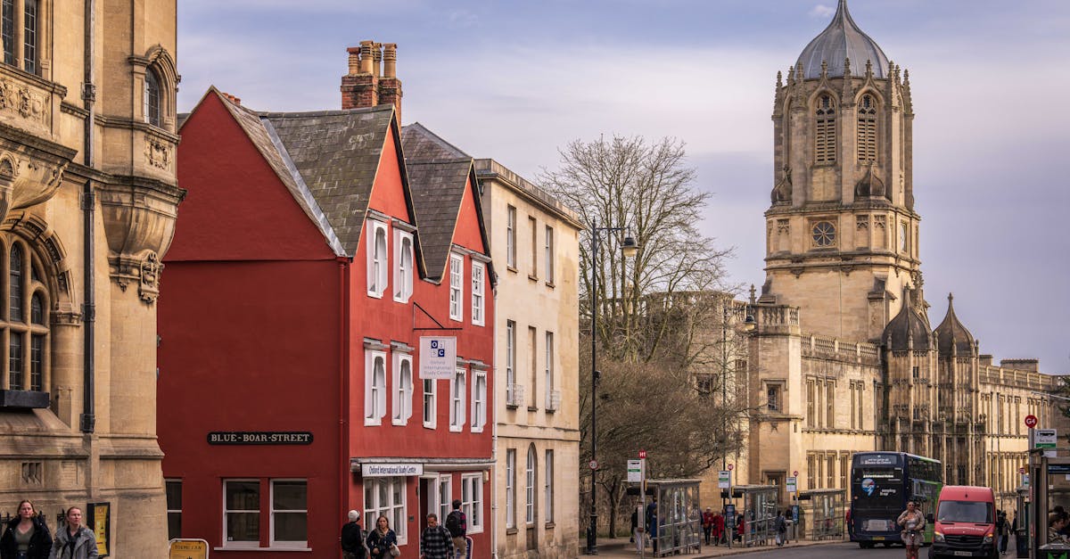 Scenic view of Christ Church College and street in Oxford, England, on a clear day.