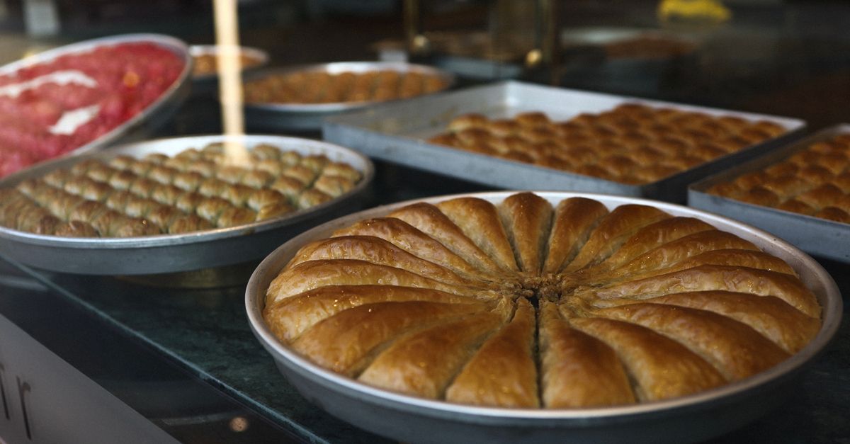 Close-up of various baklava trays on display in a Gaziantep sweet shop, Turkey.