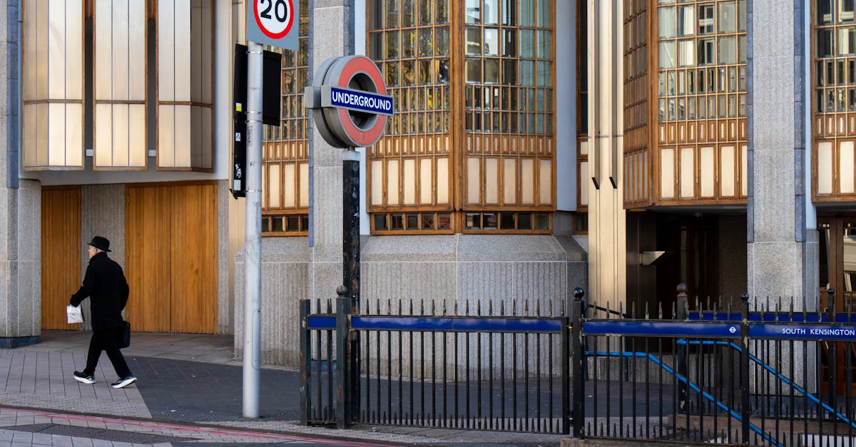 A man walks past South Kensington Underground Station in London, England.