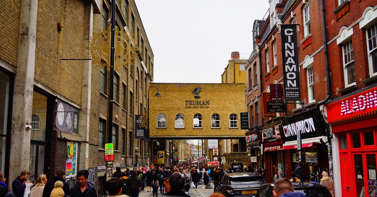 A bustling street scene near Truman Brewery in London's vibrant district.