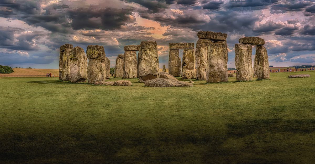 Panoramic view of Stonehenge with dramatic clouds in Wiltshire, England. Iconic prehistoric monument.